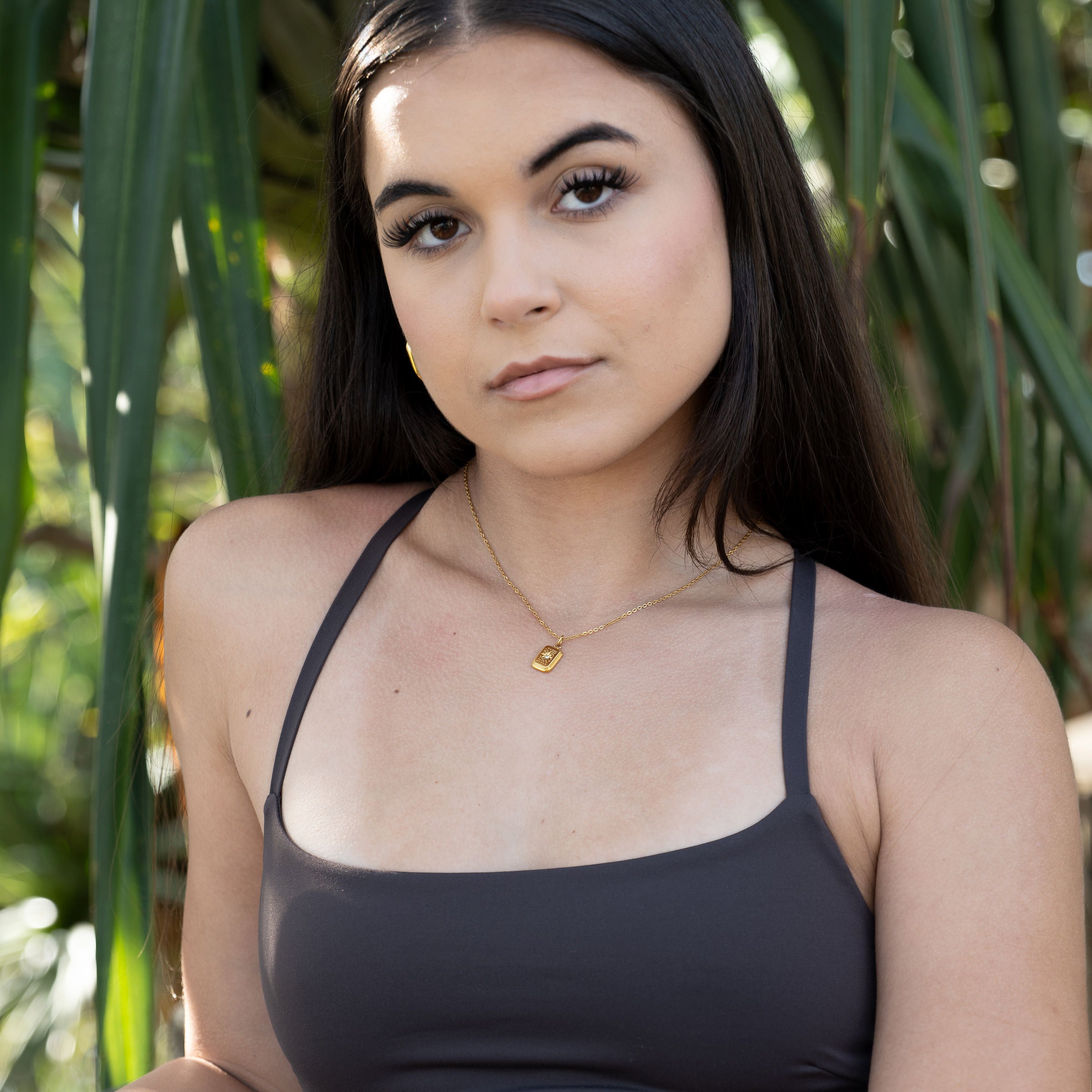 Model wearing Lyra Necklace – star pendant