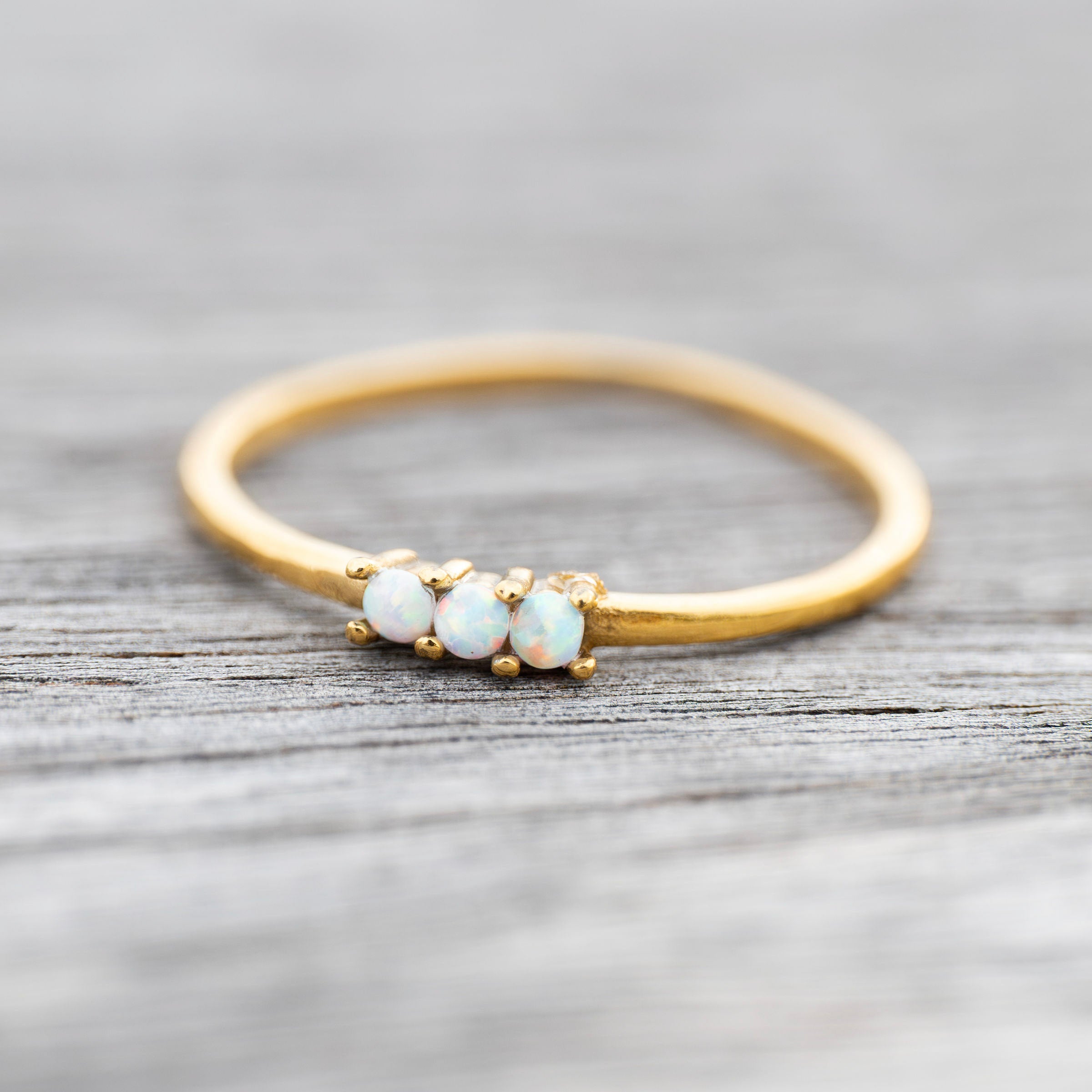 Delicate opal ring designed for stacking
