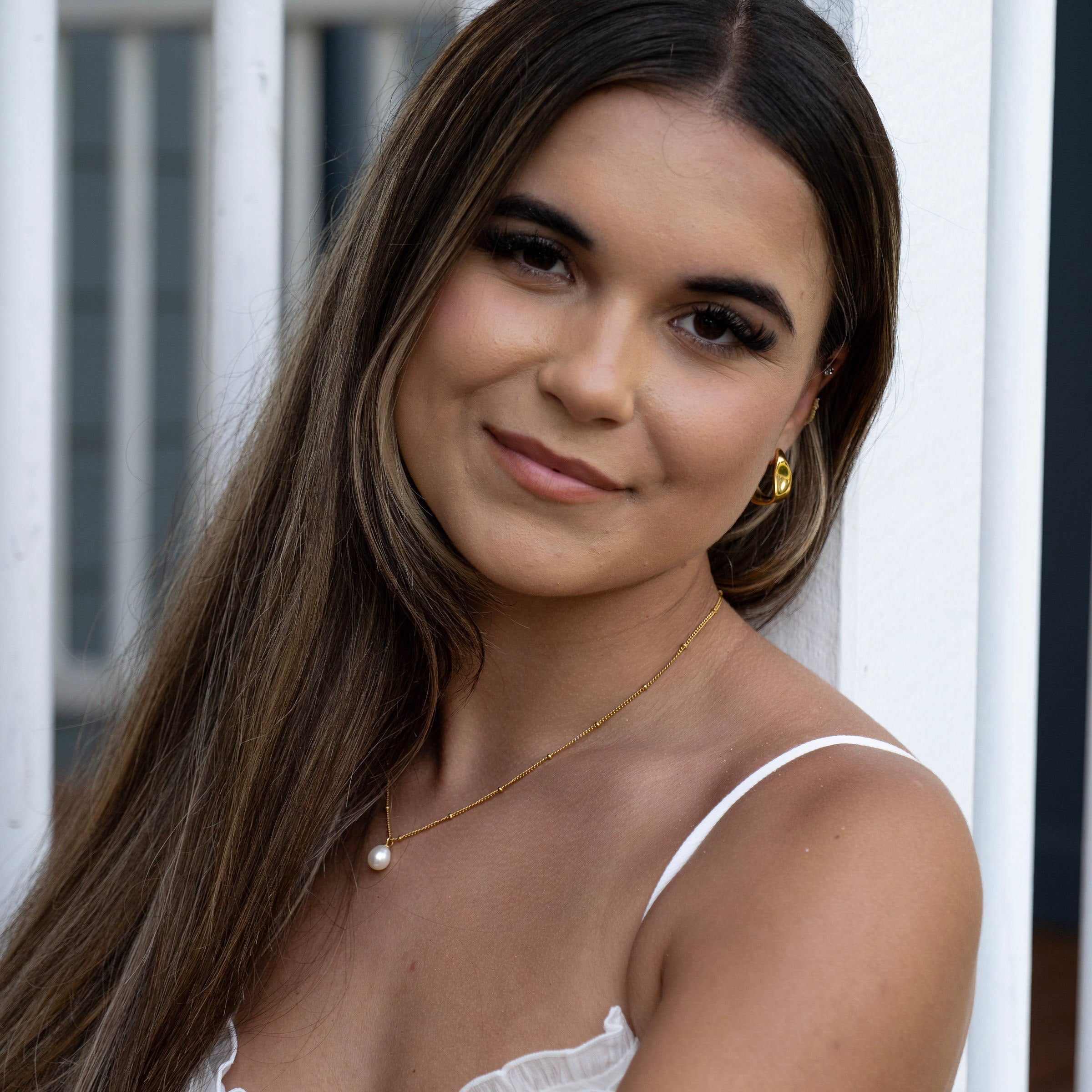 Gold pearl pendant necklace in 18K PVD stainless steel, waterproof tarnish-free jewellery worn on model